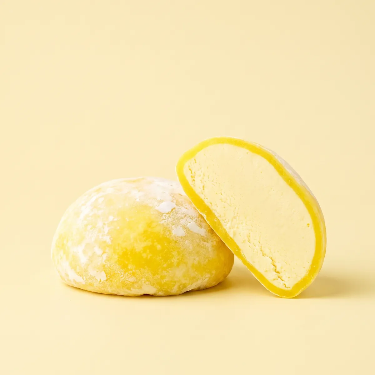 Lemon mochi, whole and cut open