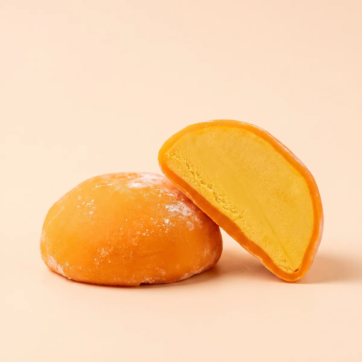 Mango mochi, whole and cut open