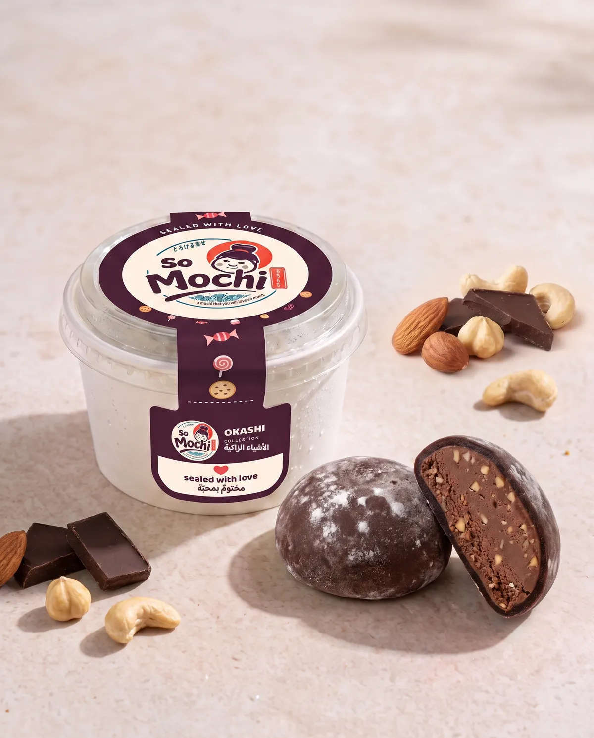 Jumbo Chocolate Nuts mochi, whole and cut open, beside its sealed So Mochi cup