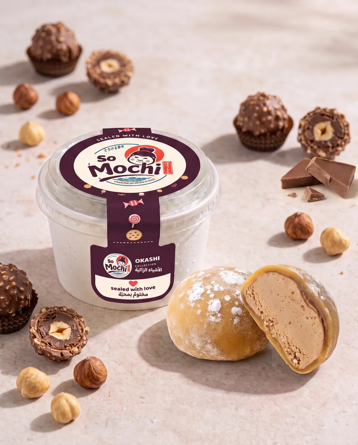 Jumbo Ferrero Rocher mochi, whole and cut open, beside its sealed So Mochi cup